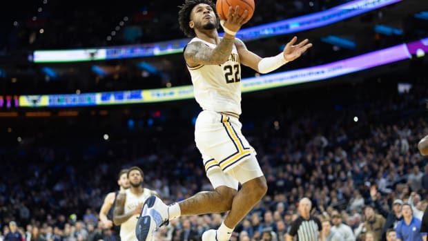 Villanova Wildcats forward Cam Whitmore (22) drives for a shot against the Connecticut Huskies during the second half at Wells Fargo Center.